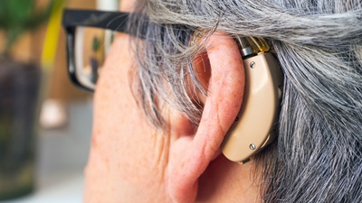 hearing aid and glasses