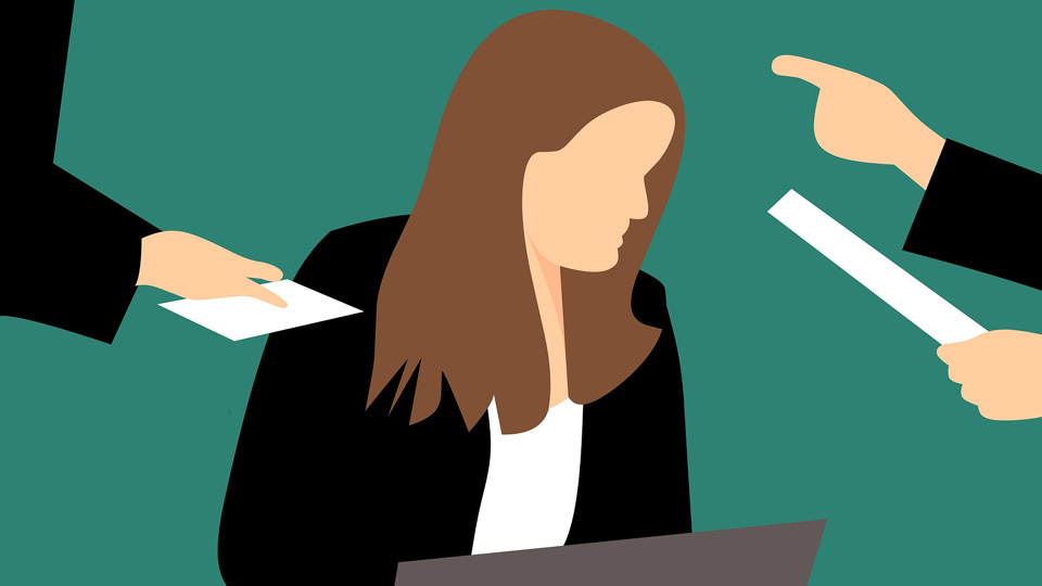Animation of a woman with brown hair wearing a black jacket and a white top sitting at a laptop. On the left hand side someone is giving her a piece of paper and on the other side some is pointing their finger and waving a piece of paper at her.