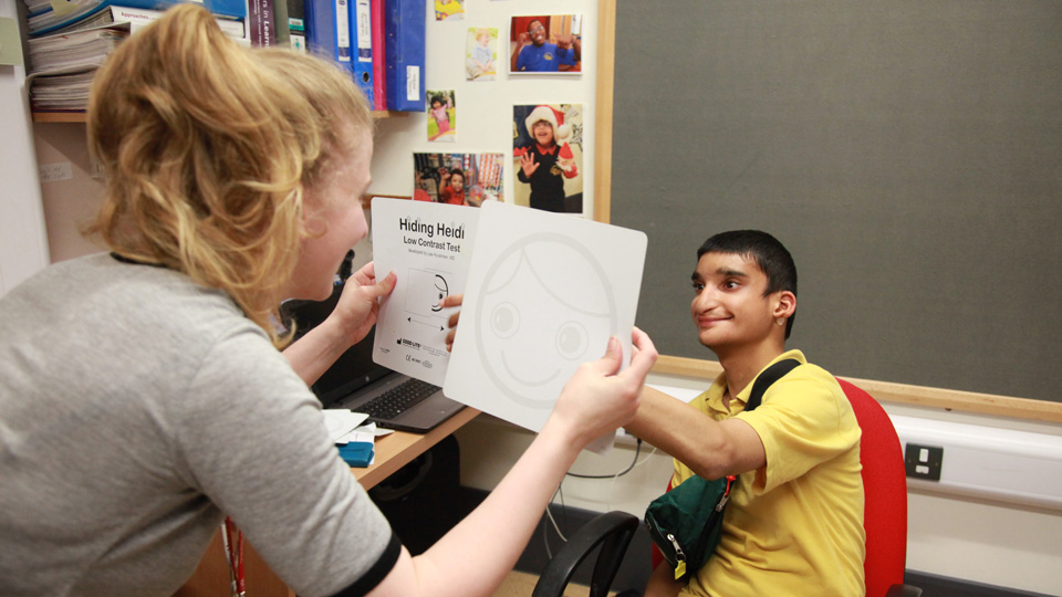 Kush having his eyes tested at his special school