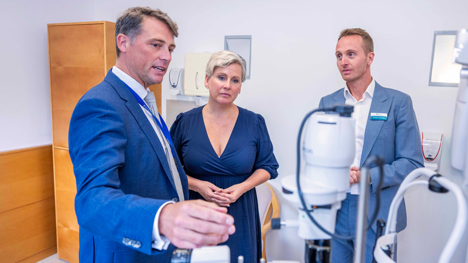 Guildford MP Angela Richardson takes a tour of a consultation room with surgeon Alex Shortt (left) and Optegra NHS director Richard Armitage