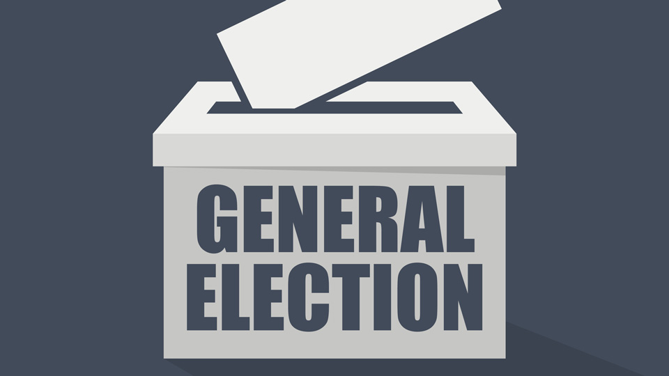 General election written on a white voting ballot box 