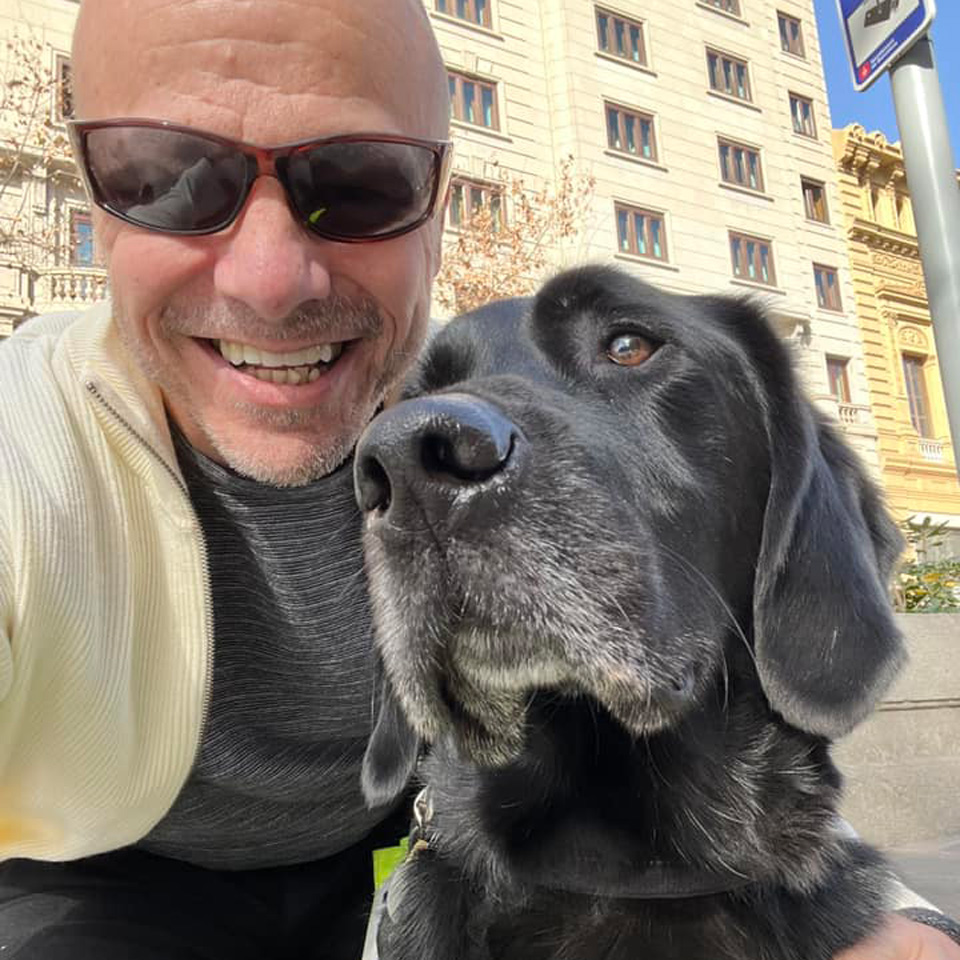 Terry Quinn with his guide dog, Spencer   