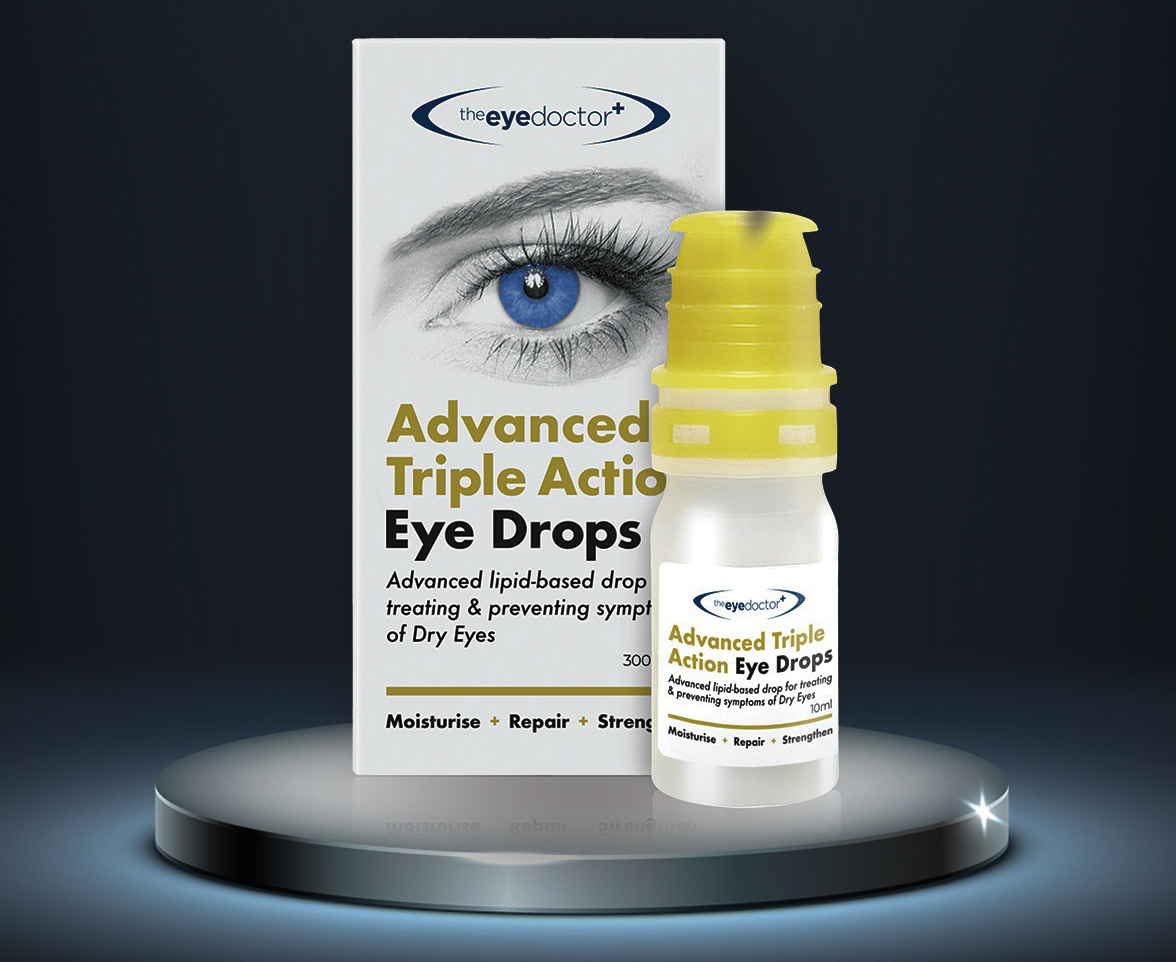A bottle of eye drops stands beside its box on an illustrated plinth