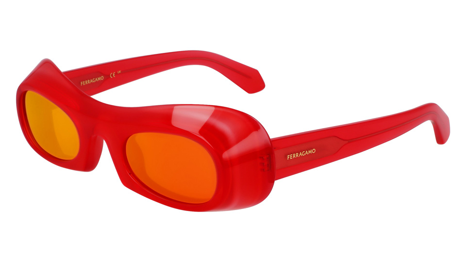 These bright red sunglasses in a glossy acetate have a bold modernist look paired with yellow lenses