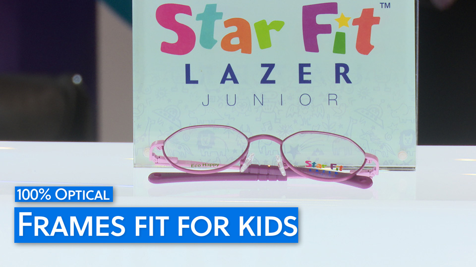 A still from the video which shows a small pair of pink spectacles in front of a rainbow sign reading: ‘Star Fit Lazer Junior’ and a headline overlaid in blue and white: ‘100% Optical Frames fit for kids’ 