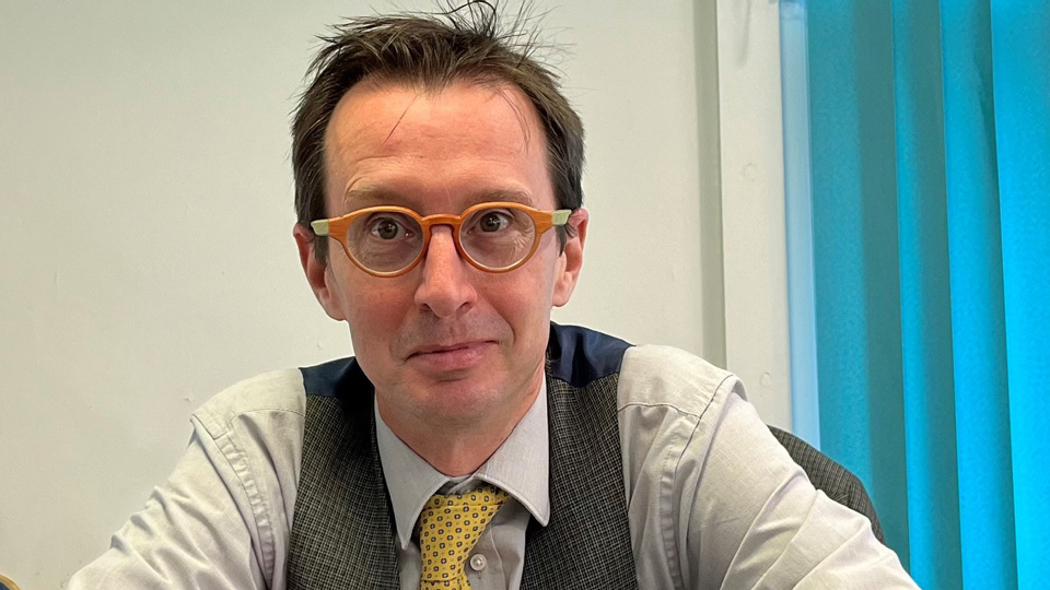 A man wearing glasses