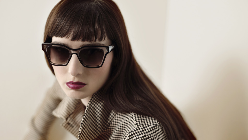 model wearing dark sunglasses 