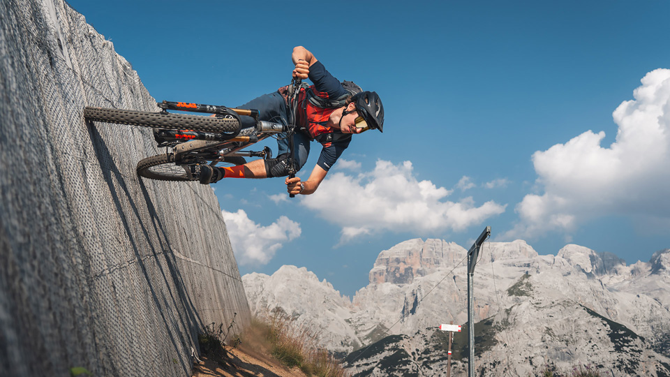 Mountainbiker, Gerald, is cycling near-horizontally along a wall