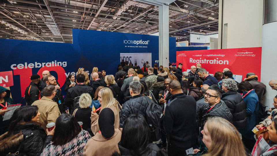 The busy exhibition entrance at 100% Optical 2024