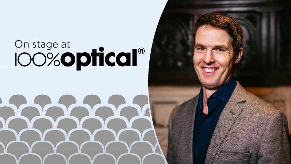A graphic includes a headshot of Damian Lake in a circle, with a light blue background and the words ‘On stage at 100% Optical’  