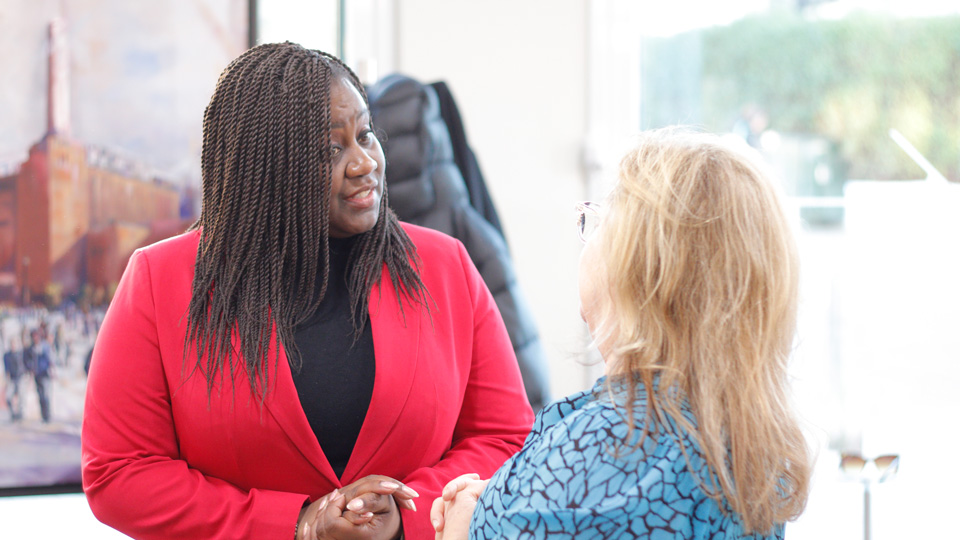 Marsha de Cordova speaking to optometrist and practice owner, Karen Lockyer