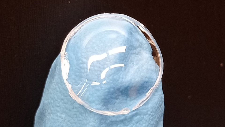 Delivering medication through a contact lens