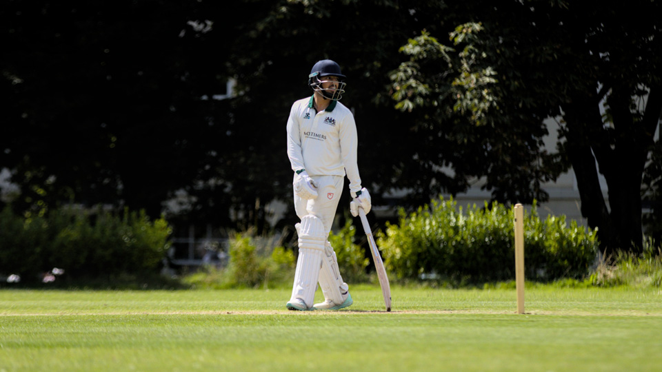 Zak in cricket whites mid-match
