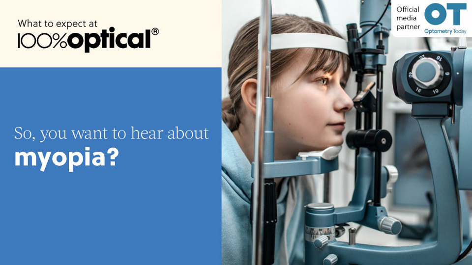 A young girl sits at a slit lamp