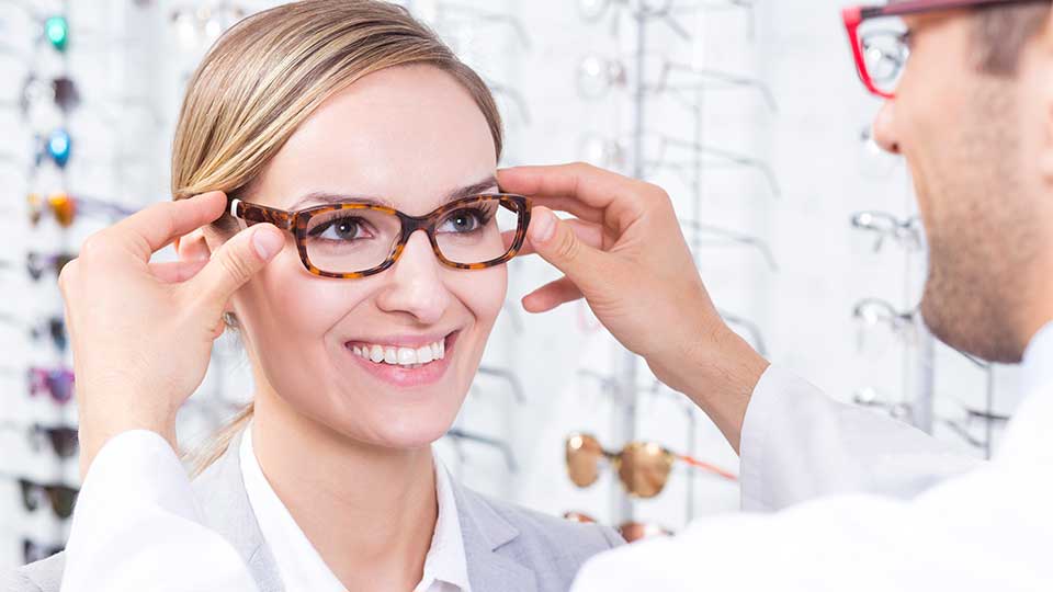 A person having a spectacles fitting