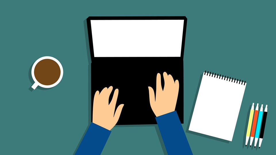 typing on laptop