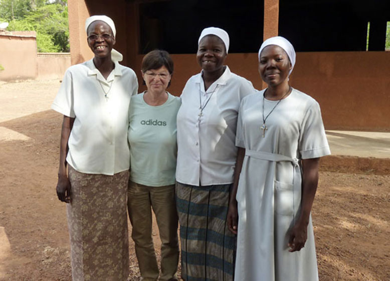 Optometrist, Bettina Hochwimmer, pictured (second from left) with the eye clinic staff in Burkino Faso
