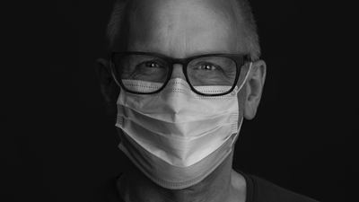 Man wearing face mask and glasses